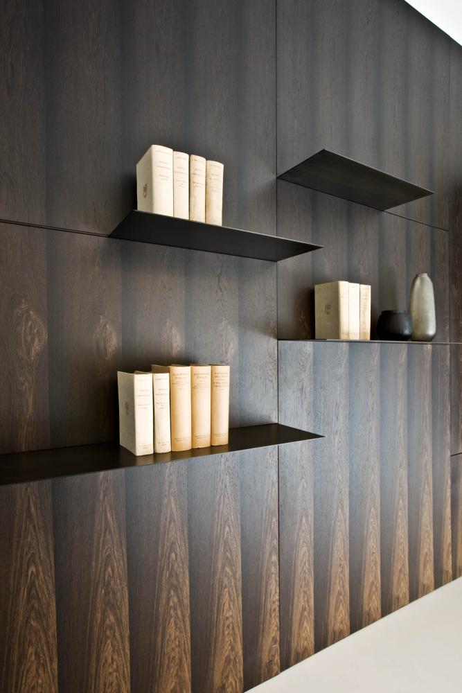 laurameroni detail of luxury custom made wall panels and shelves in metal for conference room in stone oak wood hand made in italy 