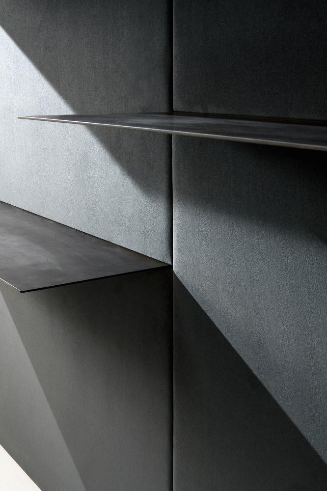 laurameroni minimal wall panels in dark grey fabric with integrated shelves