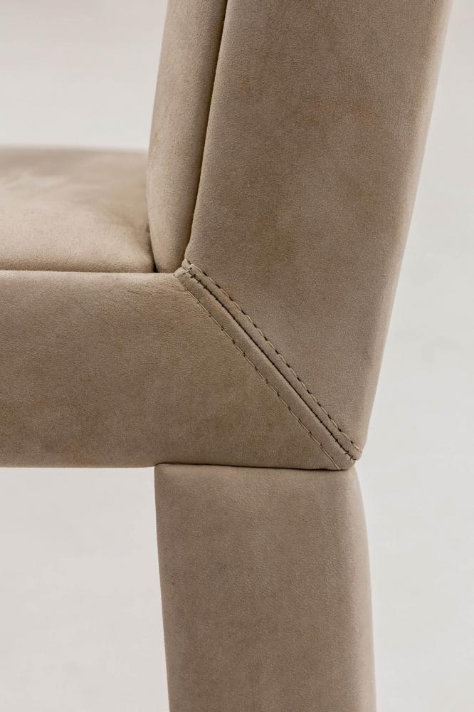 bd 20 padded customizable chair in cream nubuck leather