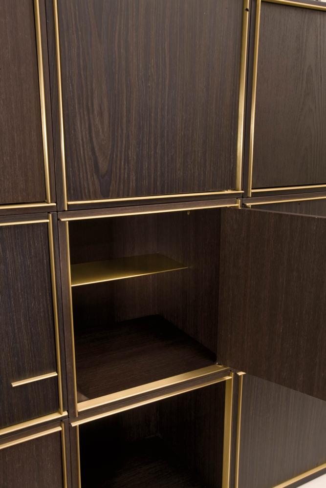 Modular luxury storage unit with brass frame dark wood structure composed as sideboard