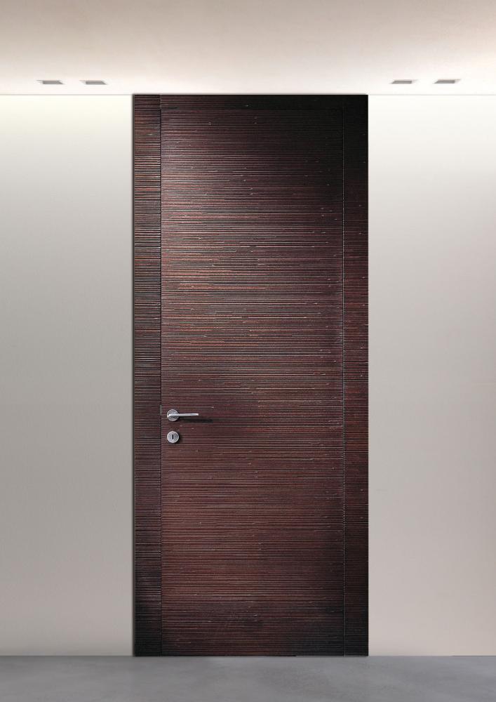 Custom made hinged door with Decor carved wood texture