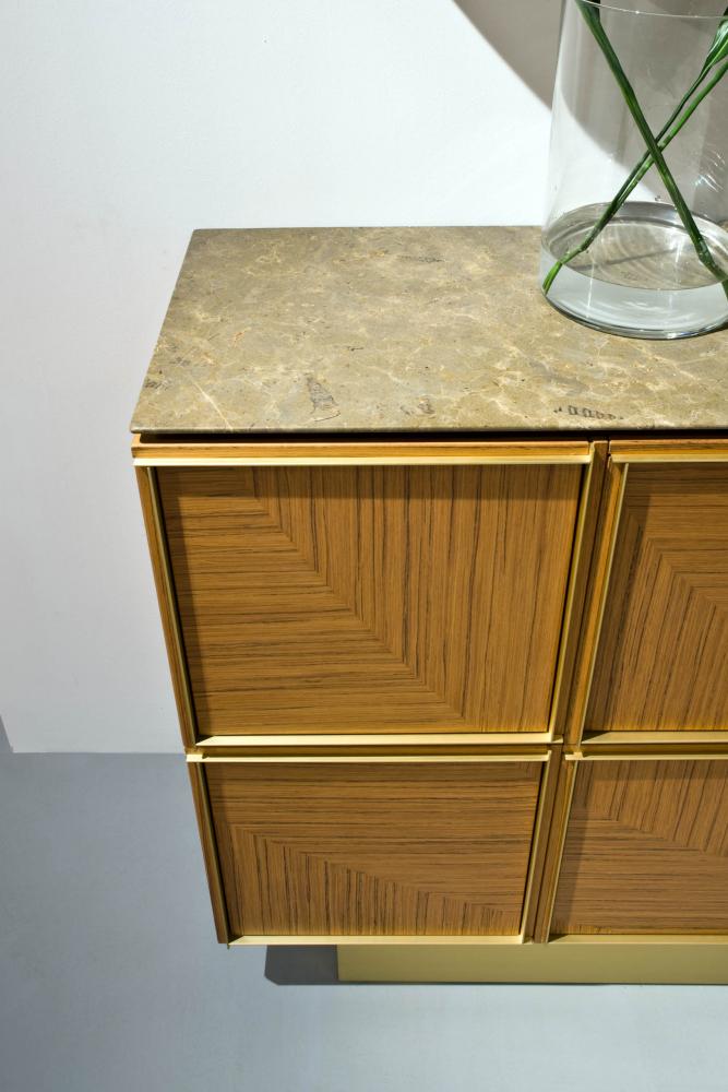 Modular luxury storage unit with brass frame and teak wood structure composed as sideboard with marble top