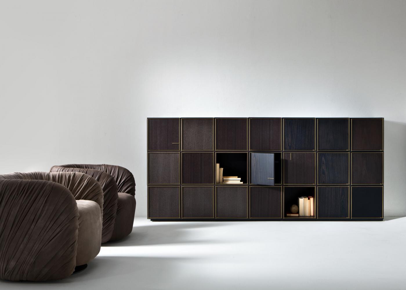 Modular luxury storage unit with brass frame dark wood structure composed as sideboard