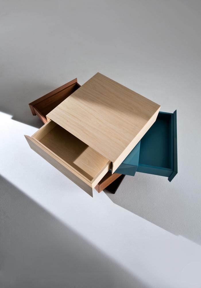 Rotating modular chest of drawers in wood with customizable finishes