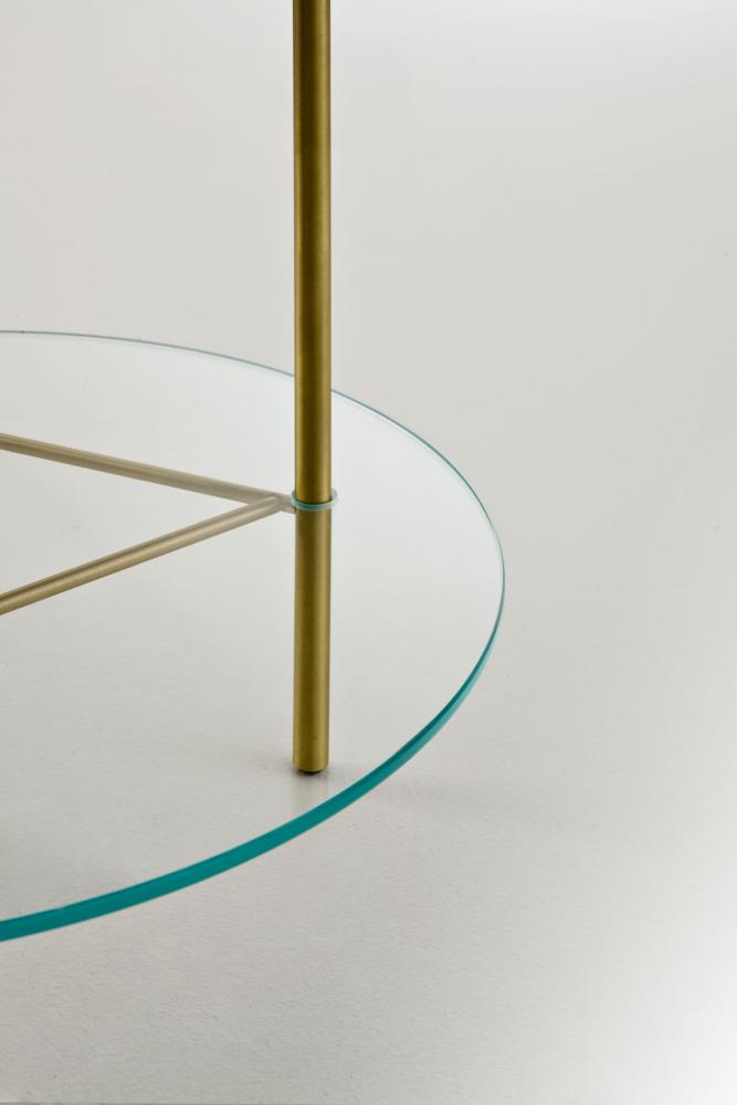 Round modern low coffee tables in brass marble and glass with minimal design
