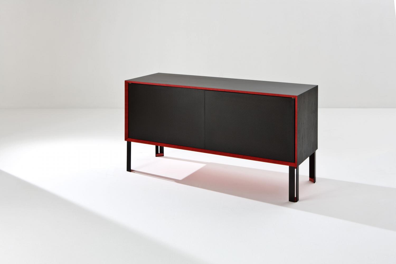 Luxury sideboard designed by Fabrizio Giugiaro handmade in Italy in carbon fiber and StoneOak wood with red frame.