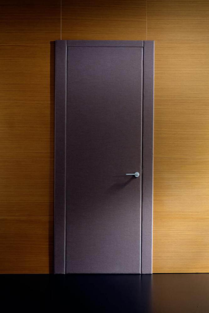 Laurameroni plain hinged door in wood or fabric for a luxury interior design