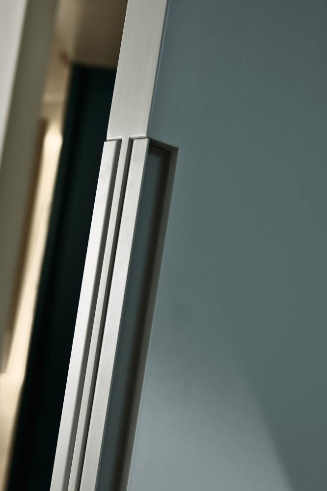Laurameroni plain pivot door in wood or fabric for a luxury interior design