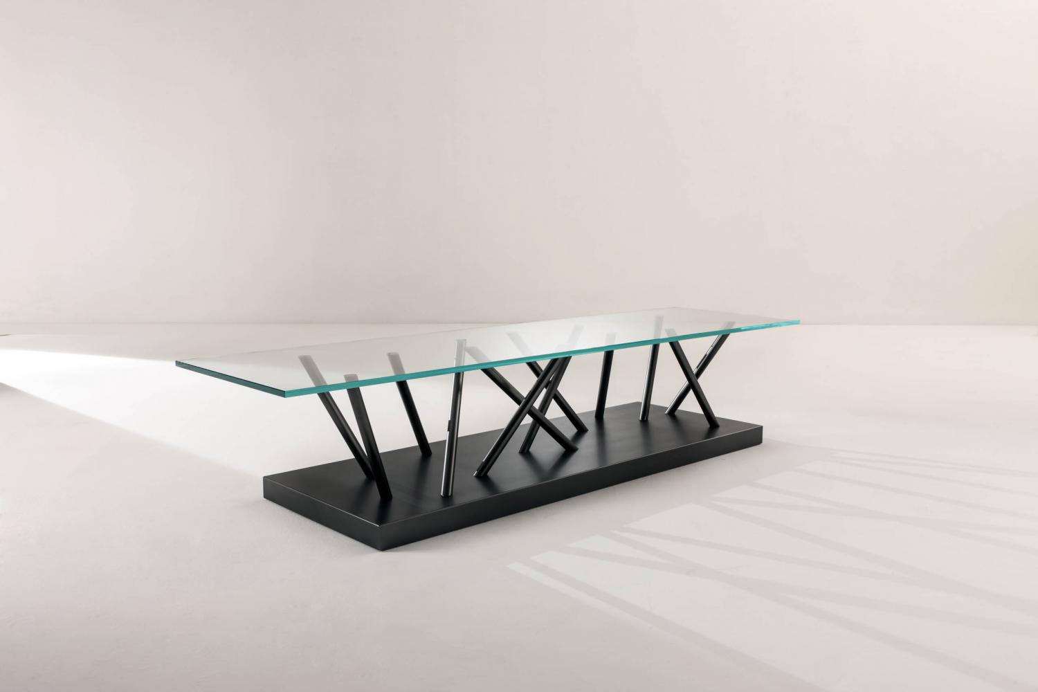 Contemporary recatngular low table in glass and steel by Ettore Sottsass