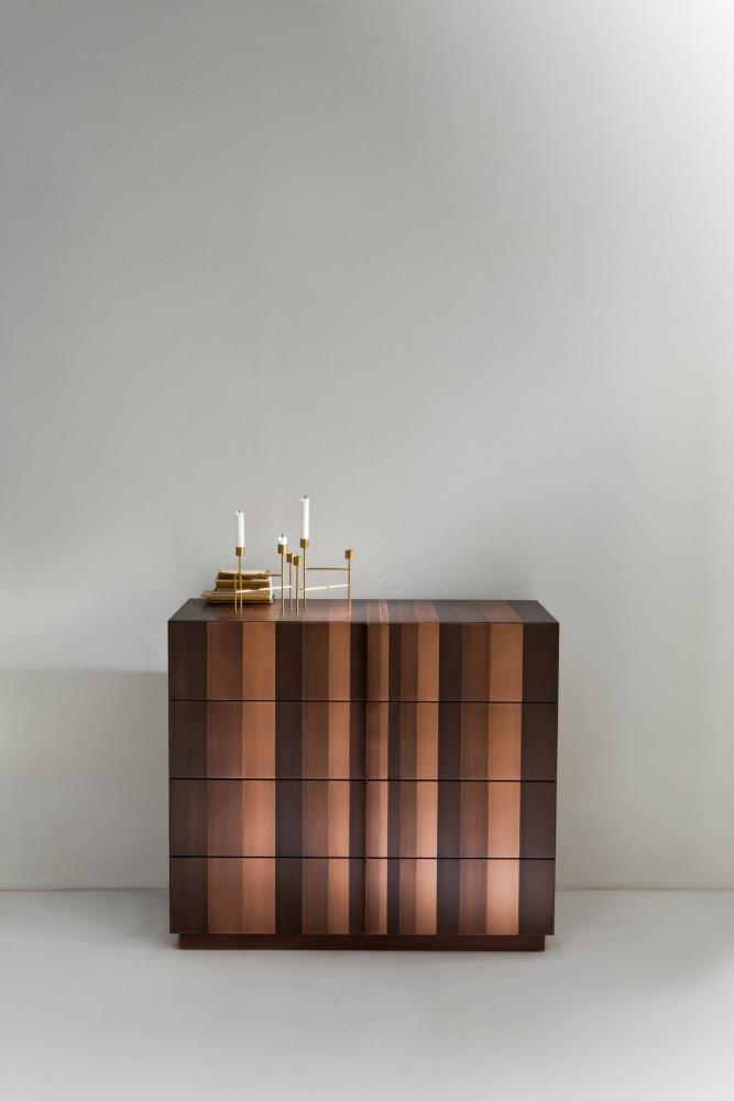 modern design luxury chest of drawers entirely clad in copper metal