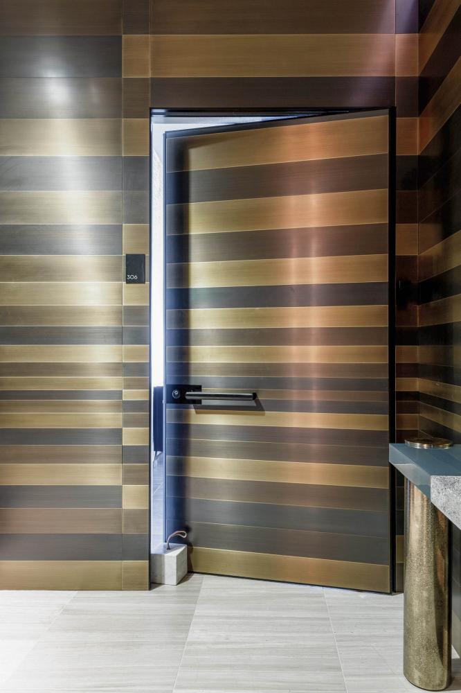 laurameroni stars collection metal wall panels and door in burnished brass