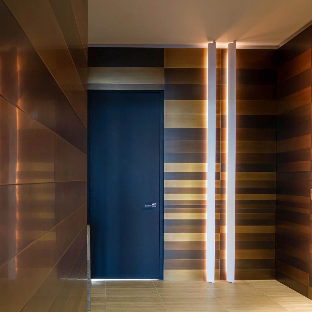 laurameroni stars collection metal wall panels and door in burnished brass