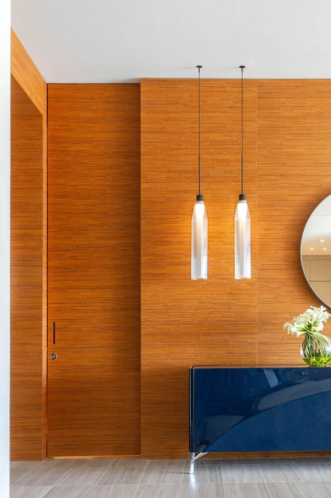 laurameroni decor textured wall panels and integrated doors in carved teak wood