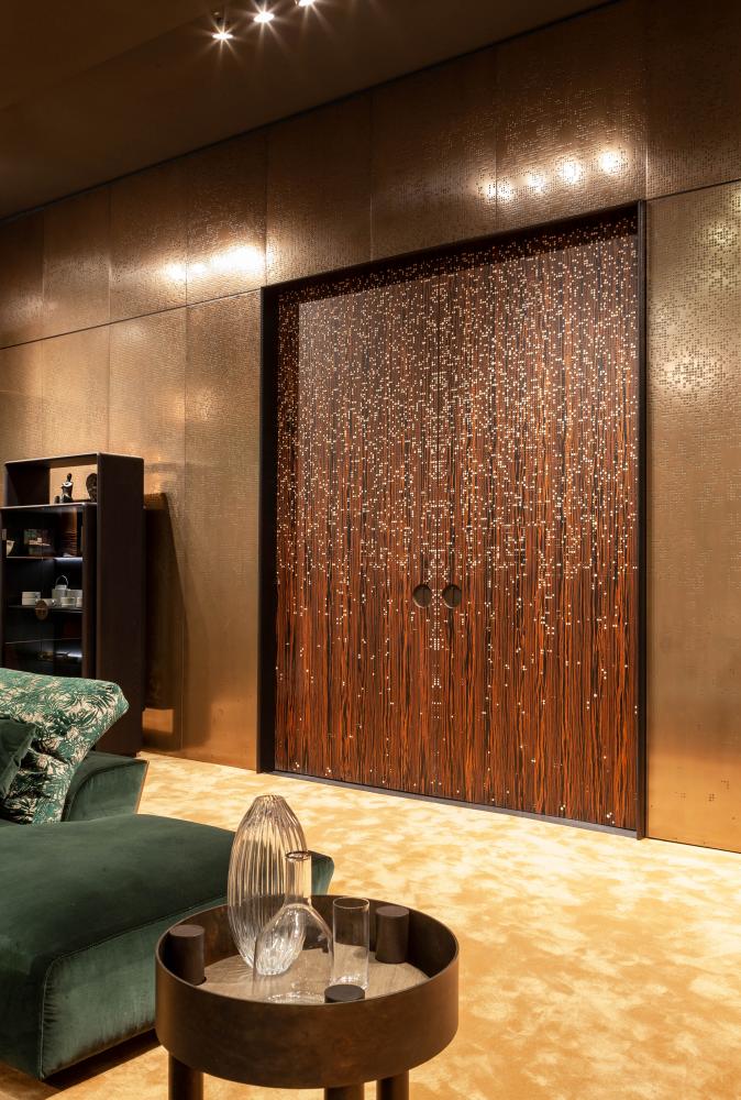 laurameroni liquid metal brass wall panels and carved wood sliding door unlimited