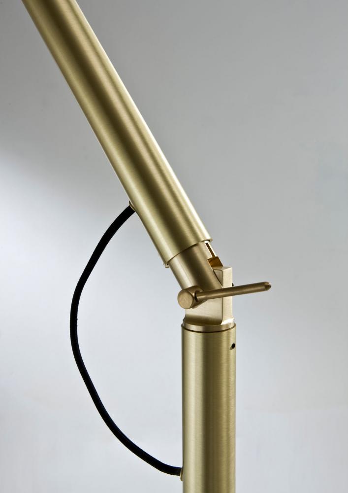 Modern cylindrical floor lamp in satin brass
