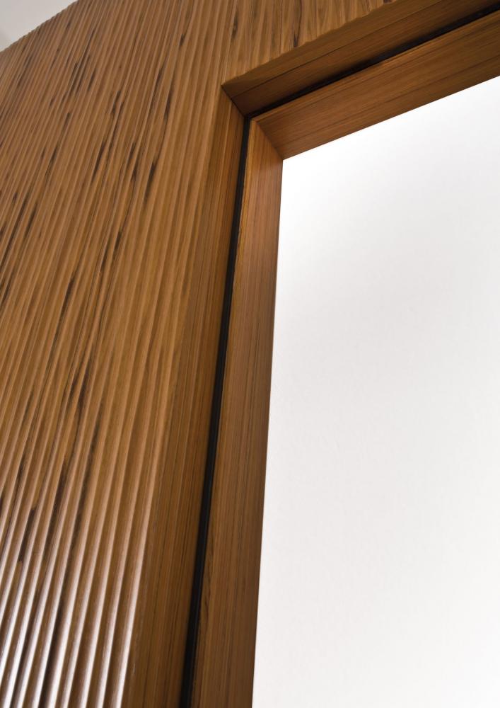 Custom made hinged doors with Onda carved wood texture